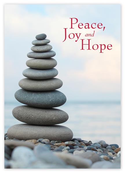 Peace-themed holiday cards with a tower of stones.
